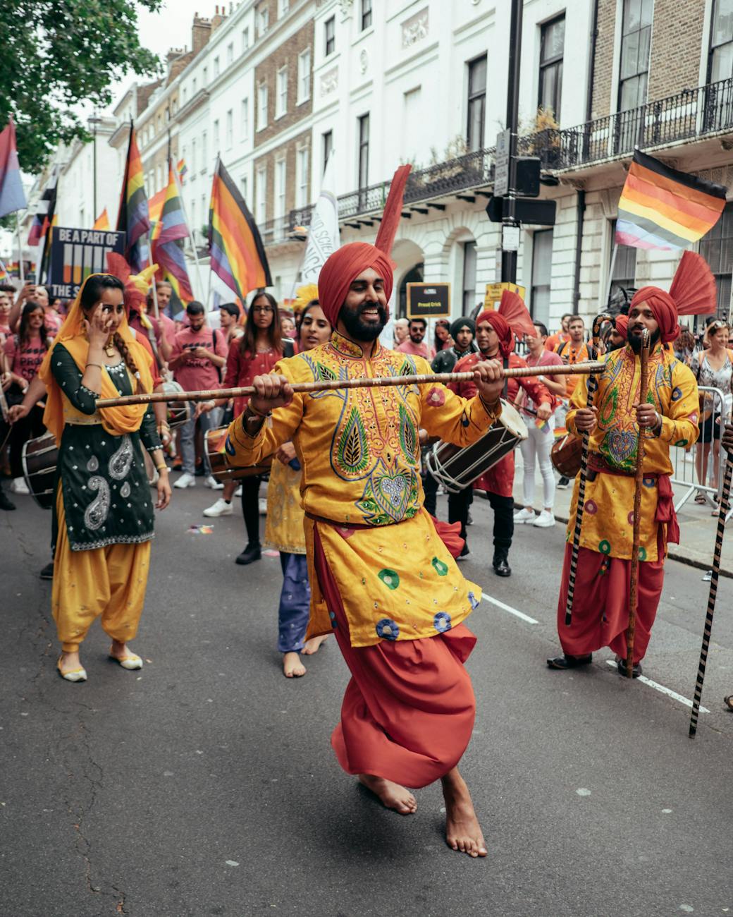 people having a parade on the street